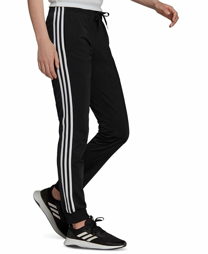 ADIDAS Women's Essentials Warm-Up Tapered 3-Stripes Track Pants 1 ADIDAS Women's Essentials Warm-Up Tapered 3-Stripes Track Pants